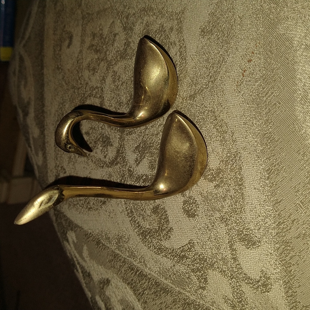 Brass swans